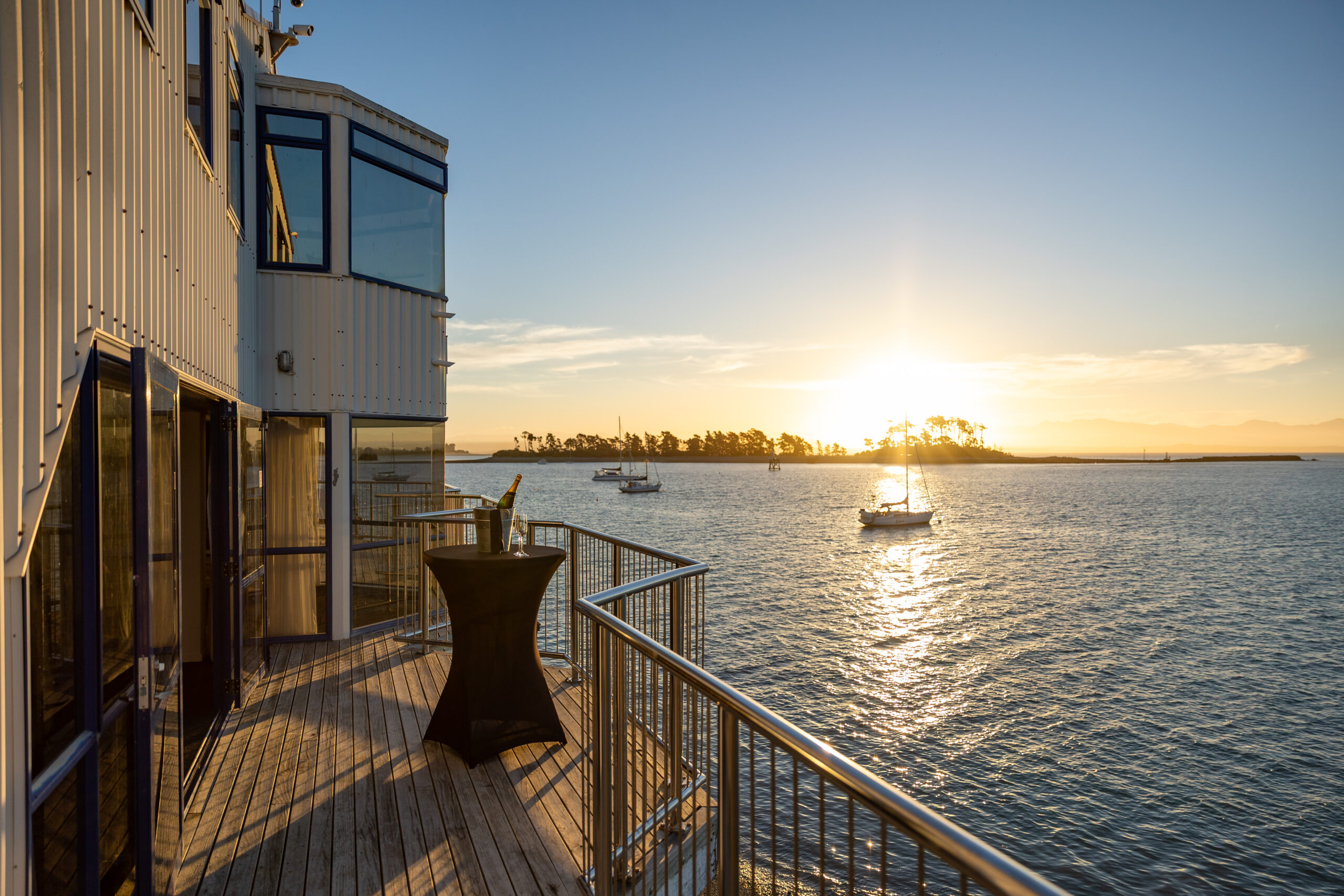 Waterfront venue for hire in Nelson NZ. The perfect sunset spot.