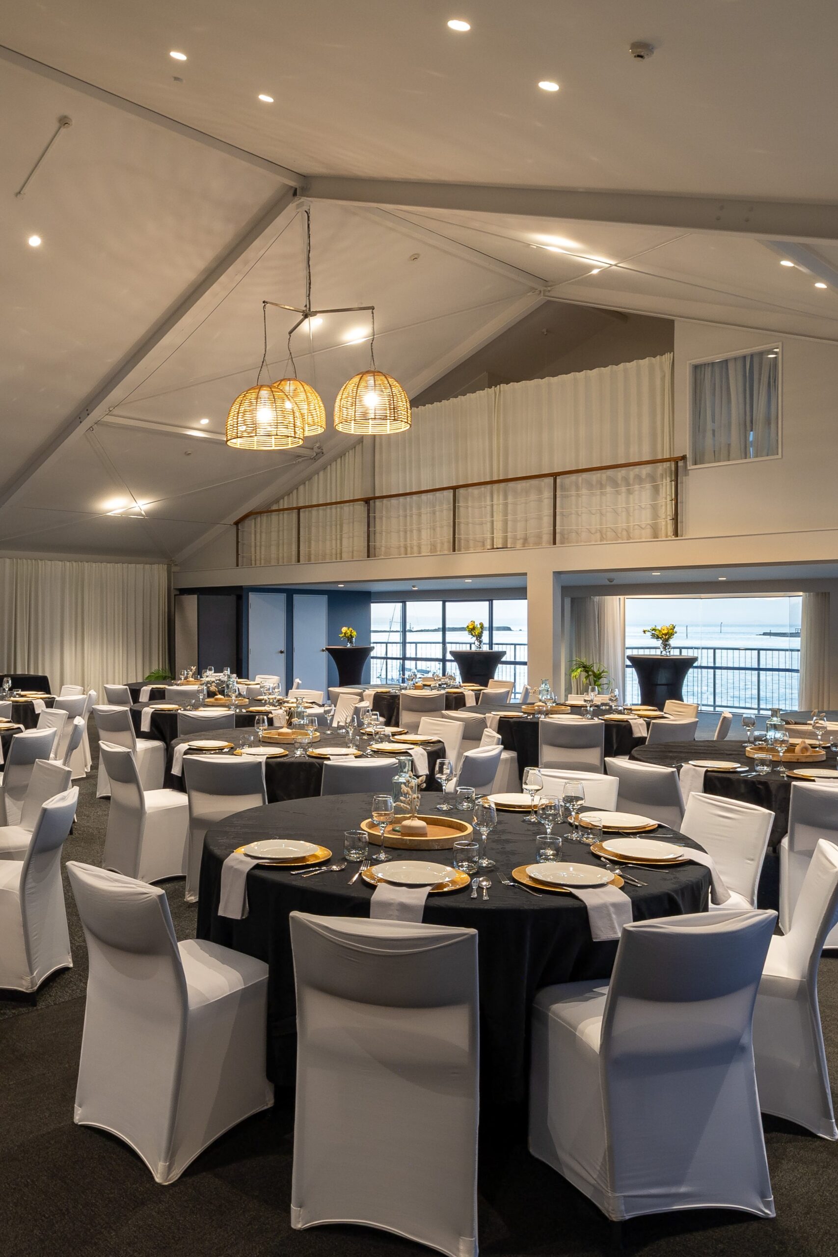 corporate dinner set up in cabaret style in Nelson waterfront venue